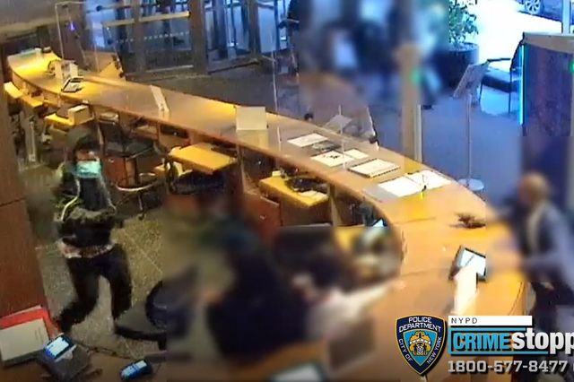 Surveillance footage released by the NYPD shows the suspect hopping over a counter before attacking employees at the Museum of Modern Art on Saturday